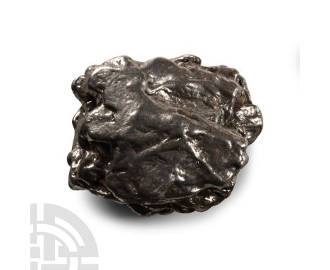 Fell 6000-5000 years B.P. A nickel-iron meteorite (IAB).  31.4 grams, 27 mm (1 in.). From a Lincolnshire, UK, collection. Pro