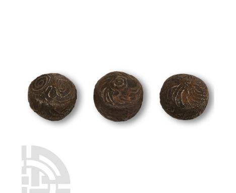 Circa 1950 A.D. Group comprising: three silver bullion 'Bullet Money' from Peluru Pitunang, iron bullet-like magic or good-lu