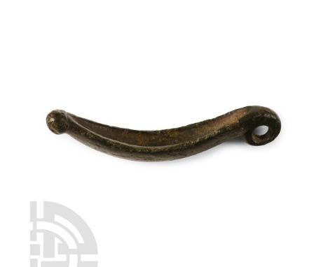 1st century B.C.-1st century A.D. Cosmetic grinder base with knop finial and pierced lug. Cf. The British Museum's Portable A