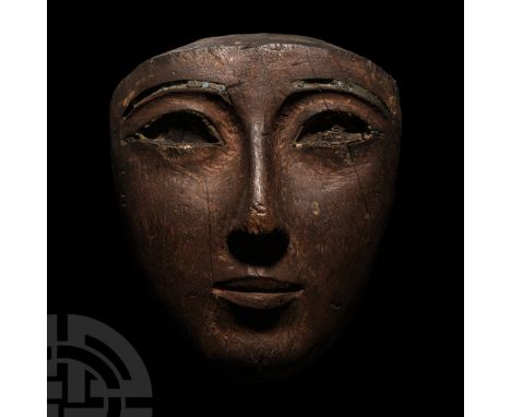 22nd-24th Dynasty, 944-716 B.C. D-shaped in plan with finely carved facial detailing, slender nose and full lips, sockets to 