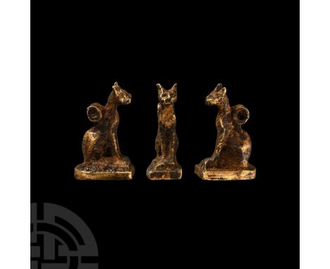 Late New Kingdom-Third Intermediate Period, circa 1069-900 B.C. Modelled seated on a tongue-shaped base, with simple facial d