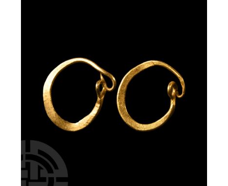 1st-4th century A.D. Each a flat-section band with hook-and-eye closure.  0.95 grams total, 12-13 mm (1/2 in.). Ian Wilkinson