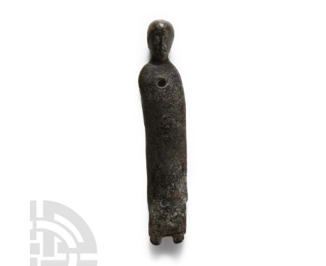 13th century A.D. Comprising a tongue-shaped curved-section body pierced in two places for attachment and forked lower end, w