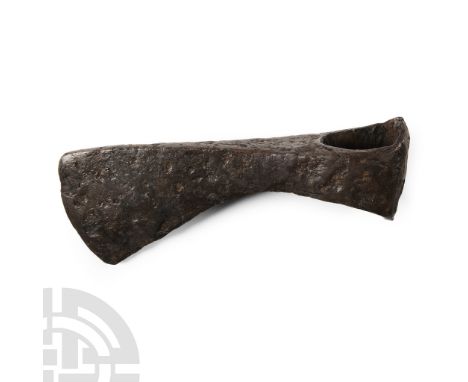 9th-11th century A.D. With triangular-section narrow blade widening to a bevelled edge, socket with rounded extension to the 