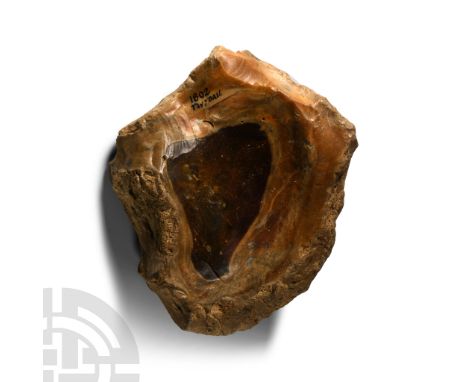 Lower Palaeolithic Period, circa 400,000 B.P. Irregular-shaped flint tool with some cortex remaining; with an old inked inscr