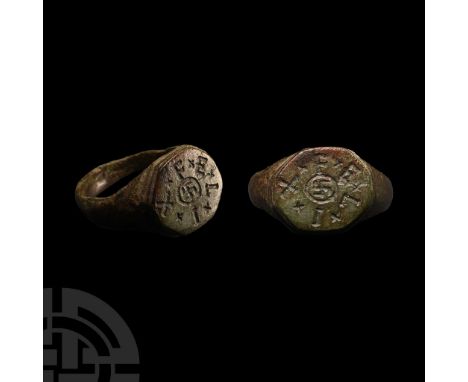 4th-5th century A.D. Tiered disc bezel with central gammadion within a ring, surrounded by '+F+E+L+I+X' legend (in Latin, 'ha