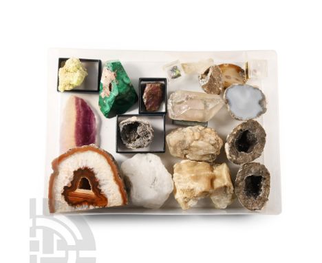 Comprising: yellow sulphur; a cut malachite specimen; smoky quartz point; vanadinite in a specimen box; agate slice; several 