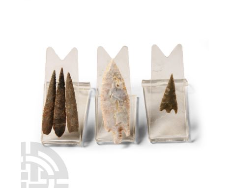 Neolithic Period, circa 5th-3rd millennium B.C. Mixed group including barbed-and-tanged and slender triangular types, mounted