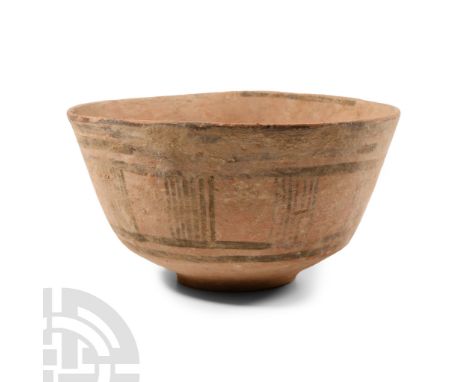 3rd-2nd millennium B.C. With carinated profile and flared rim; painted band of geometric shapes reserved on a painted field t