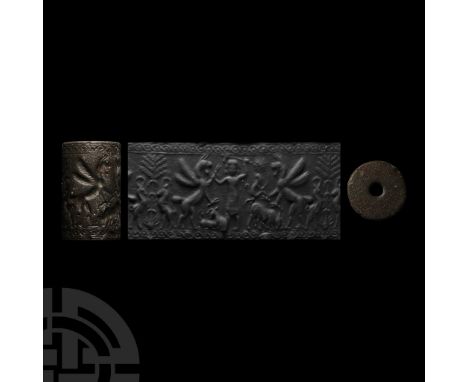 Early 1st millennium B.C. With figural frieze between two borders of guilloche ornament: central hero-figure with axe in one 