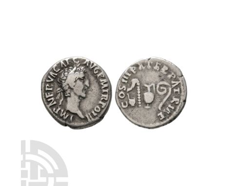 96-98 A.D. Obv: IMP NERVA CAES AVG P M TR POT II, laureate head right. Rev: COS III PATER PATRAE, ladle, sprinkler, jug and l