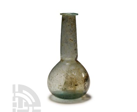 1st-2nd century A.D. or later. With bulbous body and dimple base, narrow neck and mouth with fared and folded rim. Cf. Whiteh