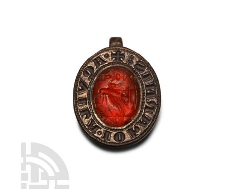 13th-14th century A.D. The outer band with incuse legend '+ AQUILA IOhANNIS' (Eagle of [Saint] John]), suspension loop above 