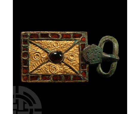 5th-6th century A.D. Comprising: ellipsoid loop with hollowed underside; tongue with D-shaped shield bearing stylised facing 