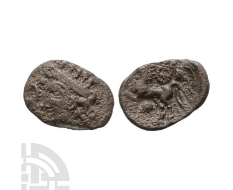 c.50-40 B.C. Obv: female head left with diadem, symbol before. Rev: prancing horse left with pellet-in-pelletted-ring, pellet