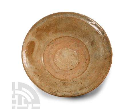 Tang Dynasty, 618-907 A.D. or later. Of broad stepped profile with flared rim, basal ring.  280 grams, 16 cm wide (6 1/4 in.)