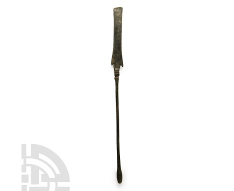1st-4th century A.D. Comprising a round-section shank with bulb finial, balustered neck, flat chisel-blade with barbs to the 