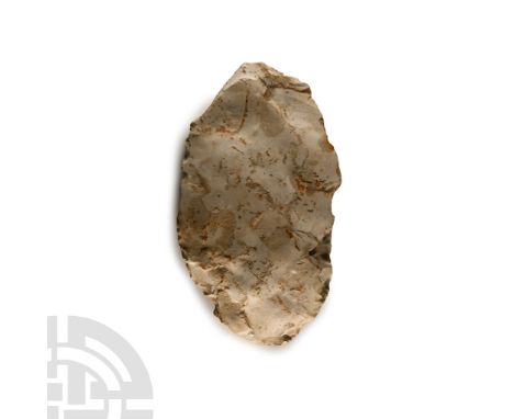Lower Palaeolithic Period, 480,000-250,000 B.C. Ovate in form with thick butt, lentoid in section, patinated white. Cf. MacGr