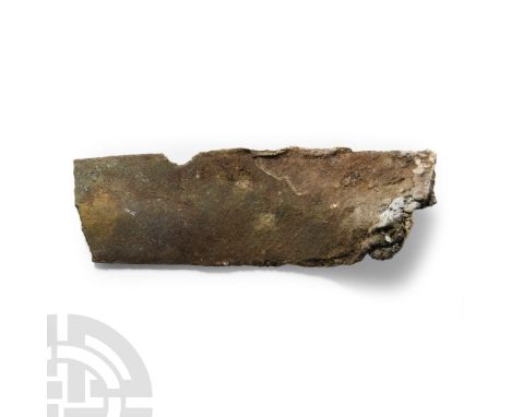 Circa 1200-800 B.C. Fragment from the blade of a two-edged slashing sword, lentoid in section and parallel sided. See Trump, 