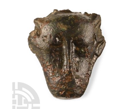 6th-8th century A.D. Piriform in plan and plano-convex in section with raised vertical rib for the nose, two scaphoid eyes, r