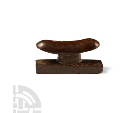Late Period, 664-332 B.C. Carved miniature headrest with rectangular base. Cf. Andrews, C., Amulets of Ancient Egypt, London,