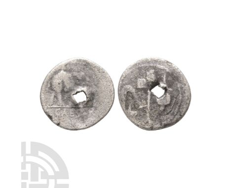 49-48 B.C. Obv: CAESAR legend in exergue with elephant right, trampling on serpent. Rev: sacrificial implements: simpulum, sp