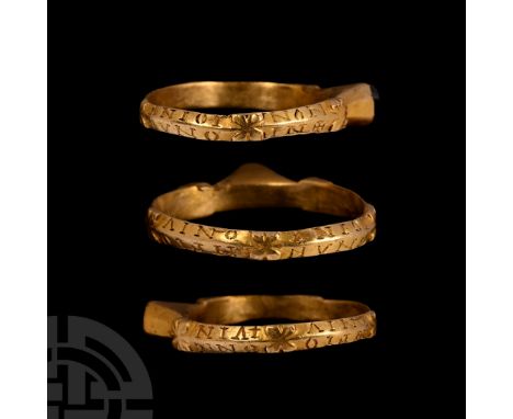 1200-1300 A.D. The bezel developing to a low pyramid with lateral facets, surmounted by an inset cabochon sapphire set within