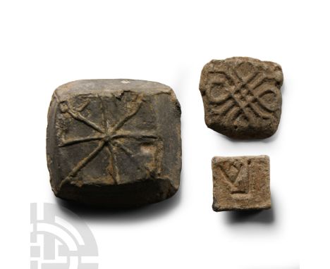 13th-15th century A.D. Comprising: a large square type with bevelled edges, low-relief compass motif; smaller square with kno