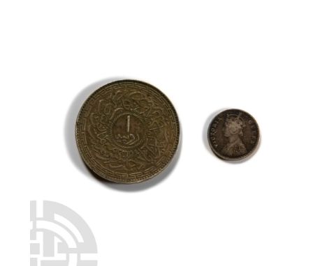 19th century A.D. Mixed silver Indian coin group comprising: one rupee and two annas dated 1862.  12.61 grams total, 10-30 mm