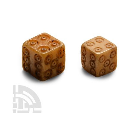 1st-4th century A.D. Cuboid with ring-and-dot making disposed 1:6, 2:5, 3:4.  2.28 grams total, 8-9 mm (3/8 in.). From the im