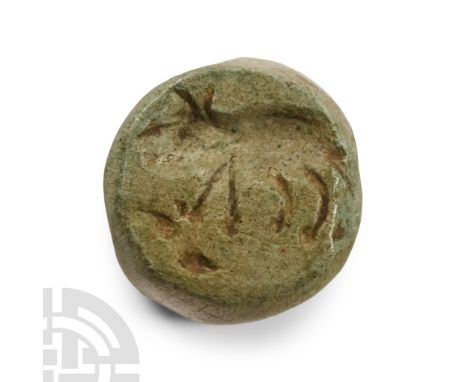 1st millennium B.C. or later. With intaglio bovine to one face and canine to the other.  1.68 grams, 11 mm (3/8 in.). From th