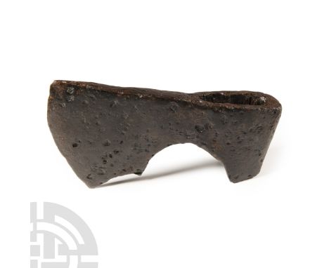 9th-11th century A.D. With triangular section narrow blade widening to a curved bevelled edge with square chin and rear spur,