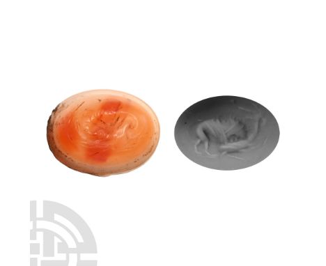 Circa 2nd century A.D. With intaglio scene of a lion attacking an ibex; supplied with a museum-quality impression.  1.55 gram