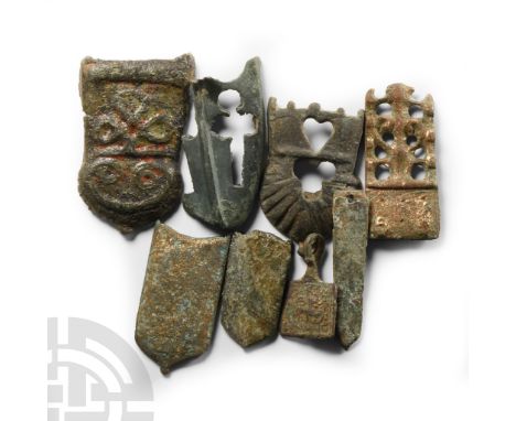 1100-1500 A.D. Including heater-shaped belt-plates, scallop-shaped scabbard chape and other items.  43.8 grams total, 24-42 m