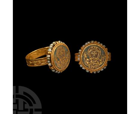 Italy, 7th century A.D. and later. Flat hoop with beaded wire borders and braided filigree ornament; discoid box bezel with s
