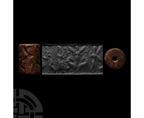 Early 1st millennium B.C. With intaglio frieze depicting a pair of addorsed ibexes in rampant pose, their horns held in the g
