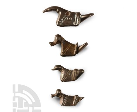 2nd century B.C.-1st century A.D. Each with saddle-shaped body, hatched bands, bulbous head, two with scooped beak and two wi