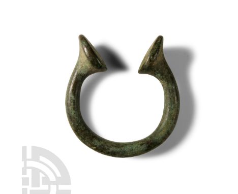19th century A.D. Penannular round-section bracelet with clubbed ends.  73.2 grams, 58 mm (1 1/4 in.). From the shipwrecked E