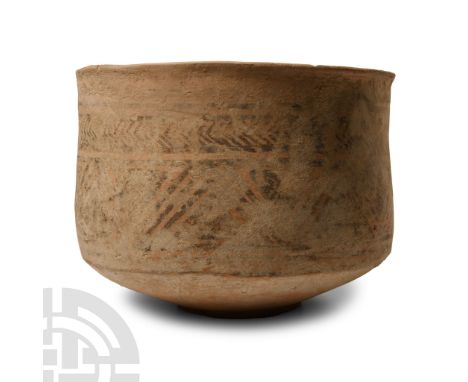 3rd-2nd millennium B.C. With slightly sloping sidewall and everted rim, narrow foot; painted geometric bands.  425 grams, 14.