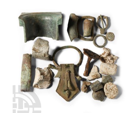 1st-4th century A.D. and later. Including lead casting blanks, buckles, the socketted base of a figurine and other items.  28