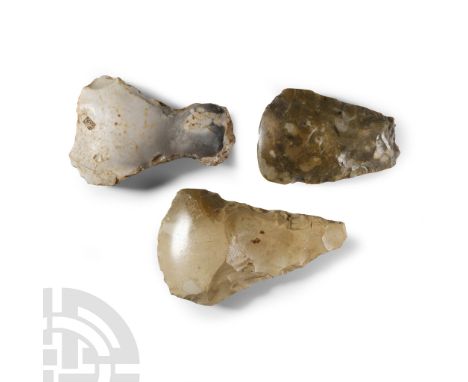 Neolithic Period, circa 5th-3rd millennium B.C. Of triangular form each with a broad cutting edge and narrow butt. Cf. MacGre
