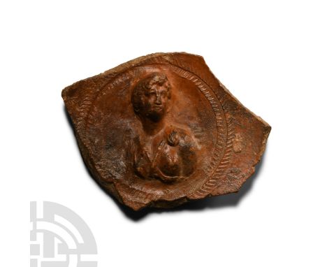 1st-2nd century A.D. Bowl or dish base with portrait of the goddess Diana modelled in the half-round within a textured border