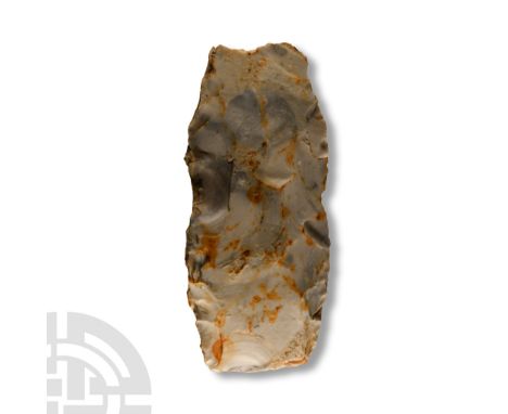 Neolithic Period, 3500-2000 B.C. Triangular in section with square butt and edge, much cortex remaining.  211 grams, 11.8 cm 