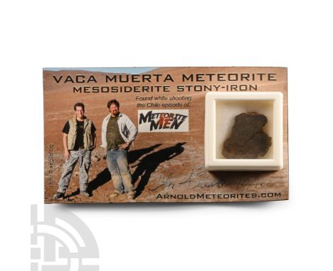 Found circa 2010 A.D. Meteorite in a cuboid capsule; Vaca Muerta.  1.67 grams, 20 mm (3/4 in.). Found in Chile's Atacama dese