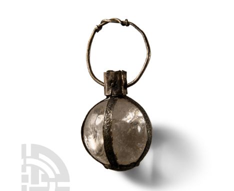 6th-7th century A.D. With discoid base and four straps containing the sphere, attached to a narrow collar at the top with a s