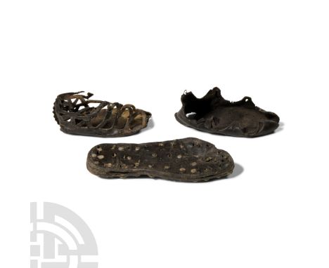 Circa 1st-2nd century A.D. Comprising: the sole of a carbatina type shoe, formed as two thick layers of leather with a third,
