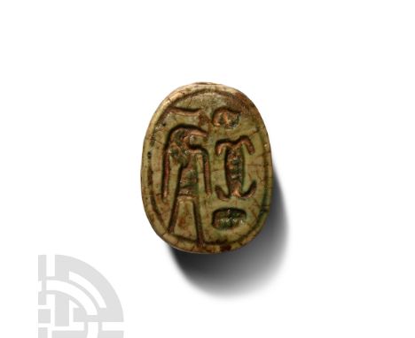 New Kingdom-Late Period, 1550-332 B.C. Underside with standing figure of Thoth facing the symbol for the goddess Neith.  1.65