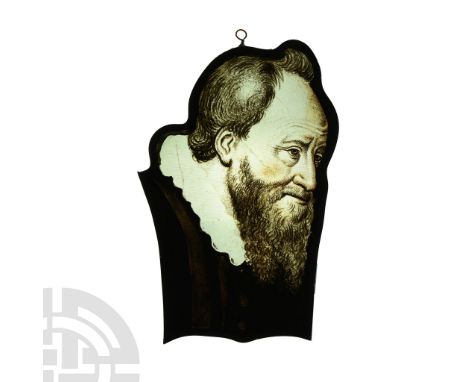 Northern France, circa 1600 A.D. Irregular panel with lead frame, detailed portrait of a bearded male with short hair, wearin