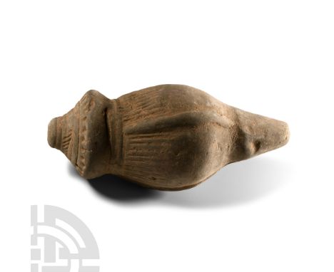 14th century A.D. Piriform body with vertical ribs, tiered collar, domed filler-hole, intended to be filled with explosive li