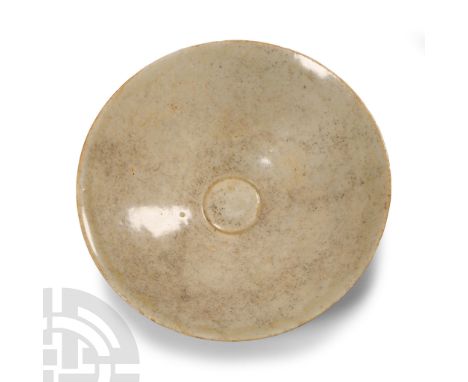 Tang Dynasty, 618-907 A.D. or later. Of low profile with circumferential rings, basal ring.  135 grams, 13 cm wide (5 in.). E